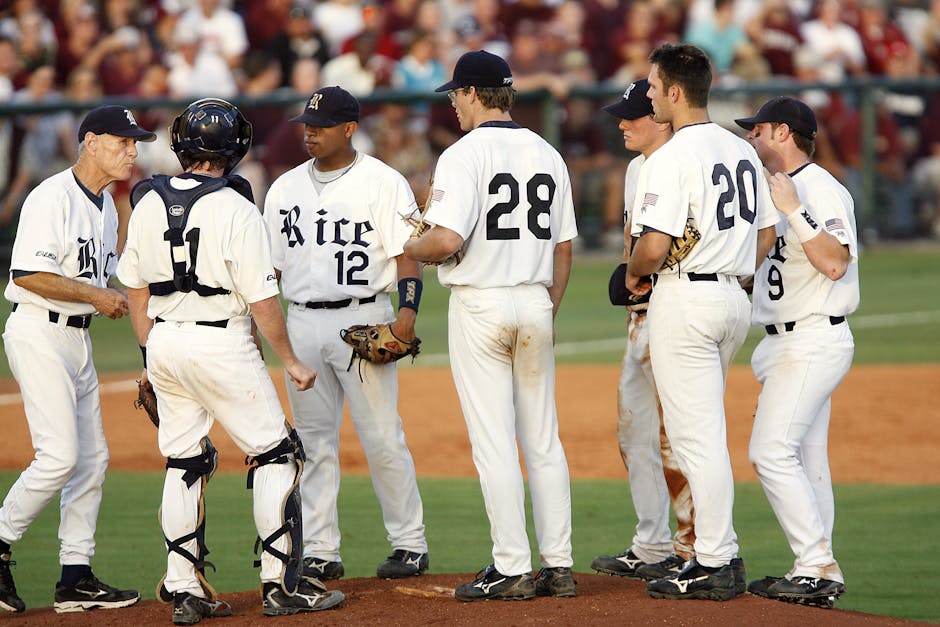 baseball coach with players