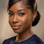 17 Slick Bun Hairstyles for Black Women with Swoop Bangs