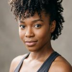 16 Curly Hairstyles for Sports in High Pineapple Puffs